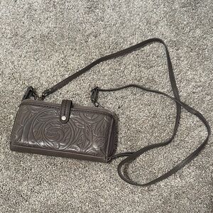 The Sak Embossed Floral Crossbody Wallet in Brown